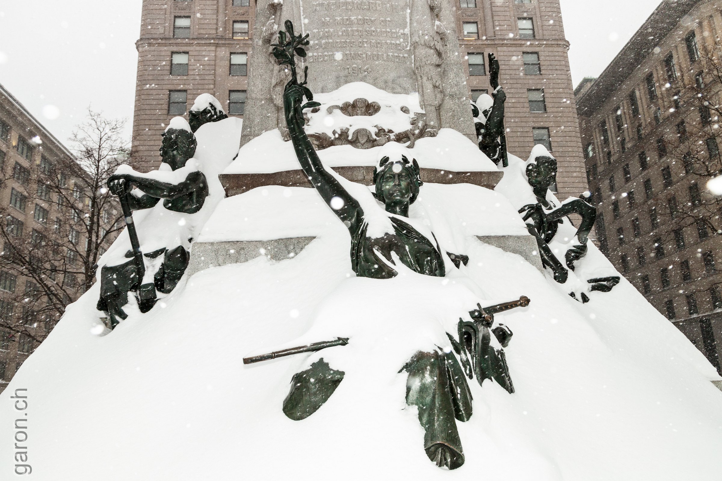 Montréal city, snow covered Edward VII Monument at Phillips Square 