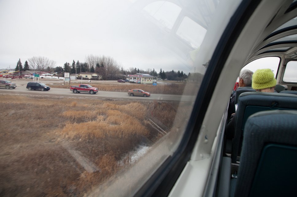Saskatchewan, Railroad trip Saskatoon to Winnipeg, Via Rail Railroad crossing seen from the train's panorama window